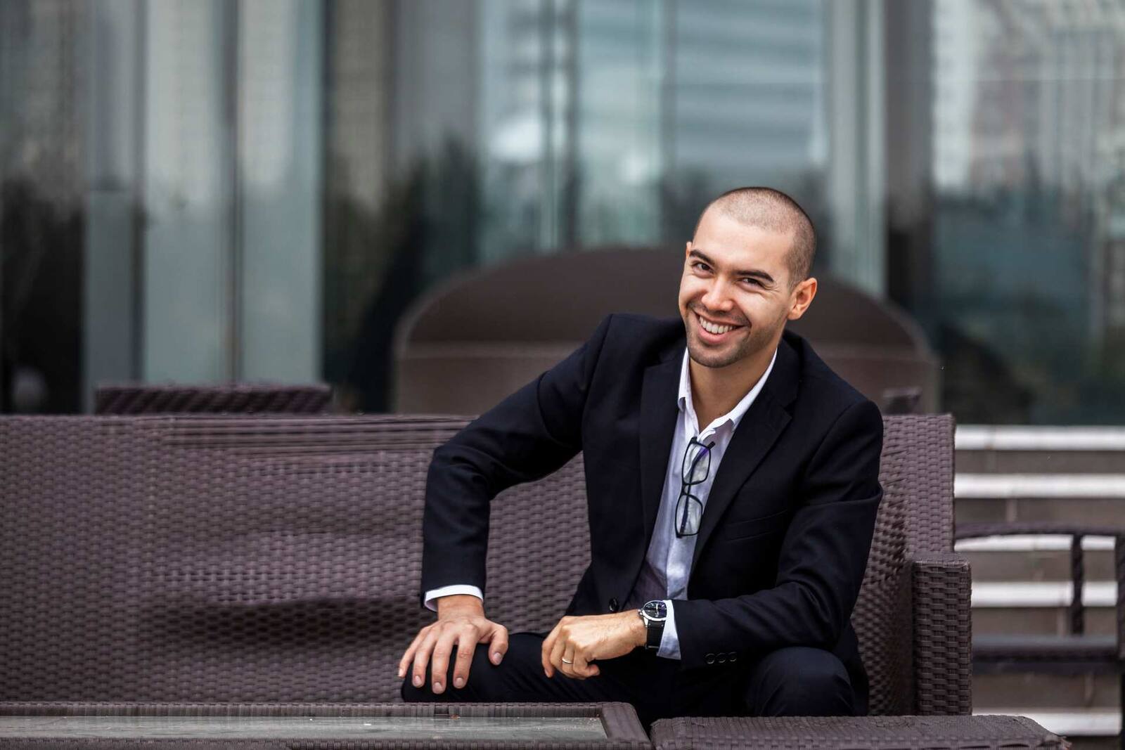 A smiling executive in a dark suit on an office terrace, a generic stand-in for Novo Nordisk leadership