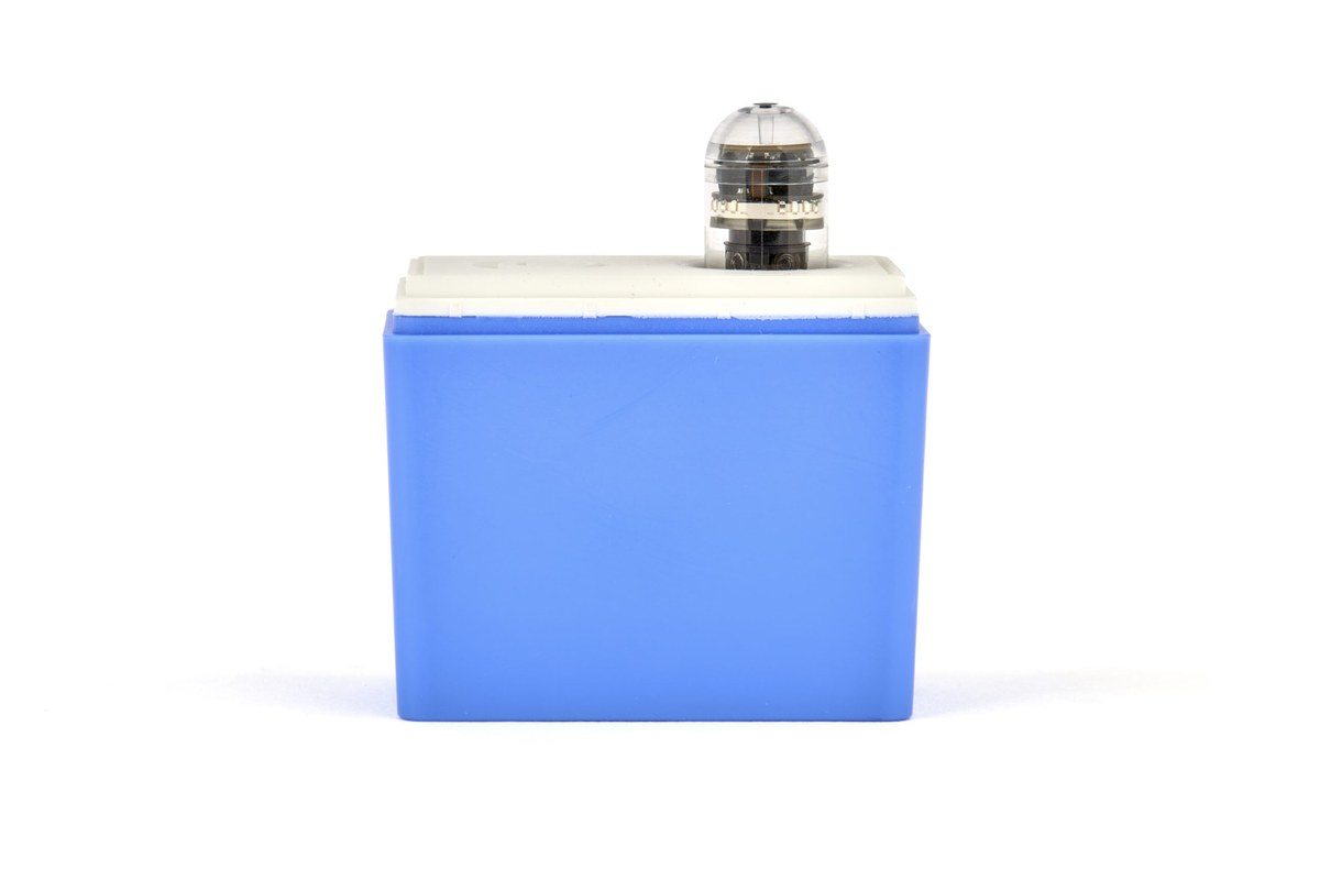 The CapsoCam Plus capsule endoscope, its clear dome showing the internal cameras and LEDs, photographed against a white background