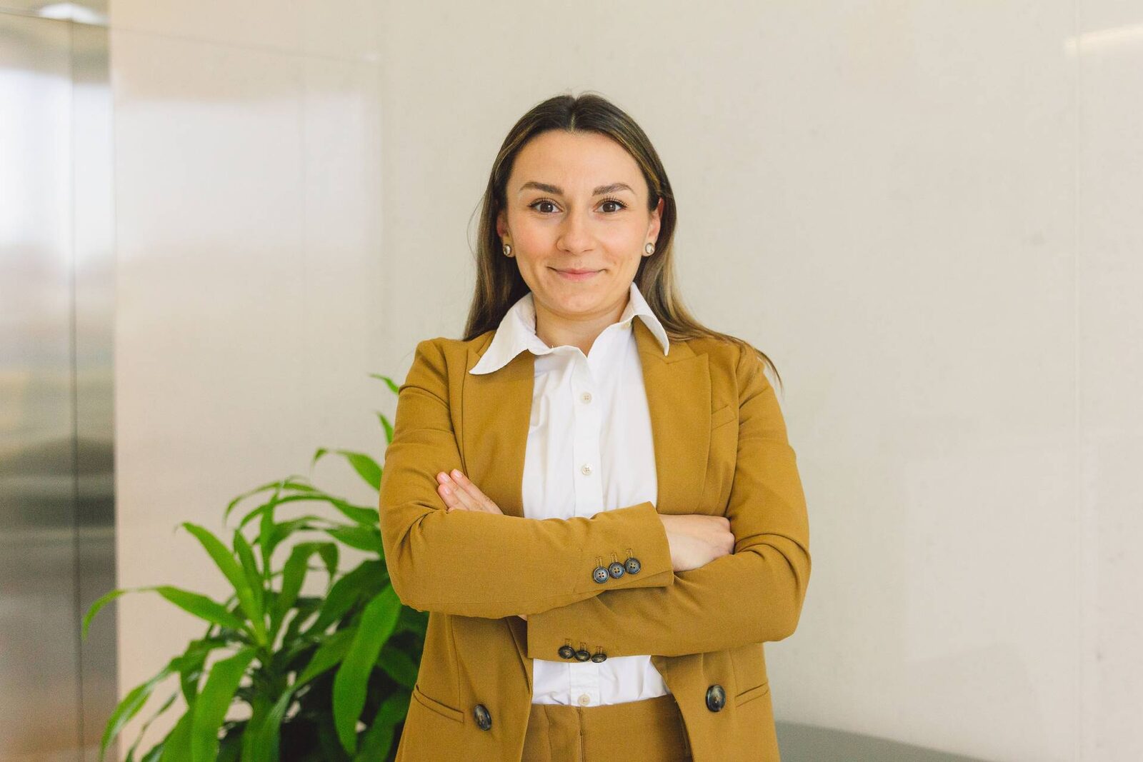 A healthcare professional in business attire, standing in for the regulatory and clinical affairs response to an FDA device alert