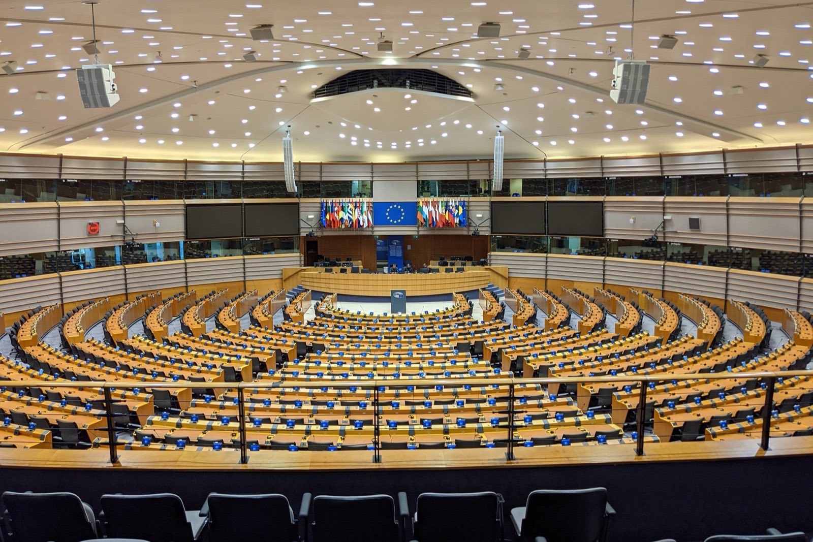 The hemicycle of the European Parliament in Brussels, seats arced around the presidency bench
