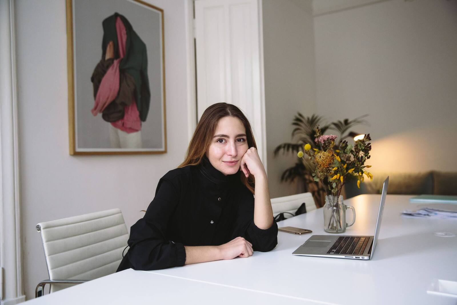 A company executive working at a laptop, a generic corporate stand-in — not a depiction of Janssen-Cilag or Johnson & Johnson staff