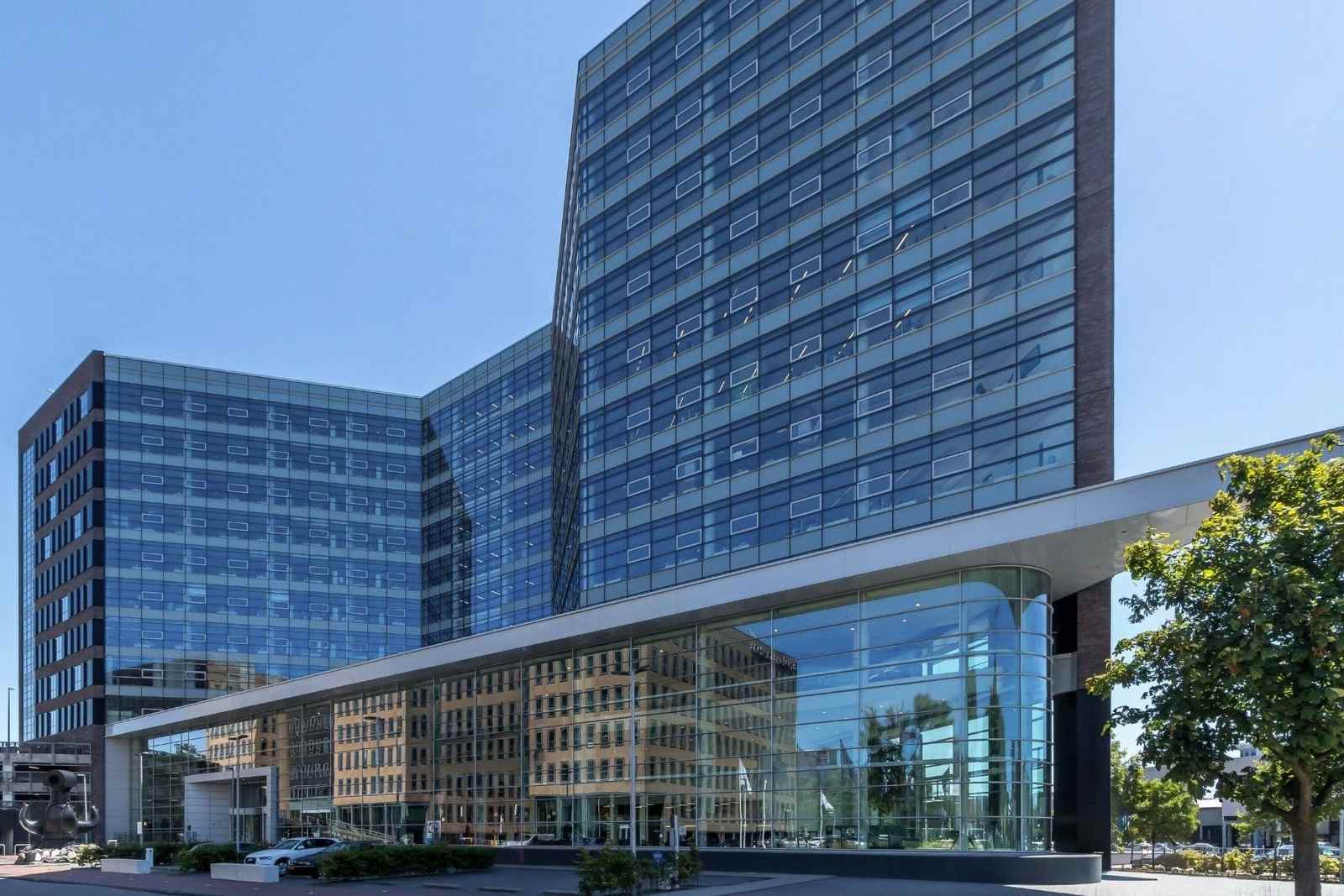 Pharming Group&rsquo;s glass-fronted global headquarters at Darwinweg 24 in Leiden, the Netherlands, on a clear day