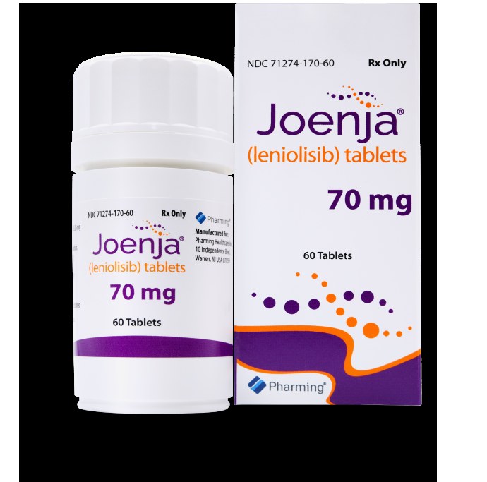 A white Joenja (leniolisib) 70 mg bottle of 60 tablets beside its purple-and-orange carton, both carrying the Pharming mark