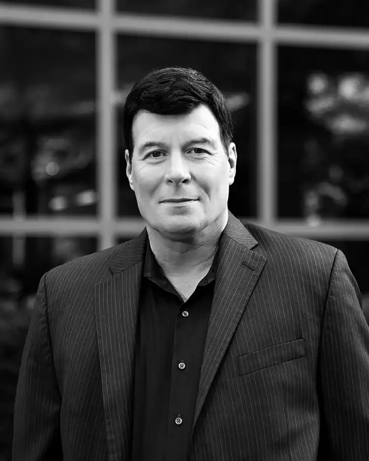 Black-and-white portrait of Dr. Michael Myers, chairman and chief executive of Quoin Pharmaceuticals