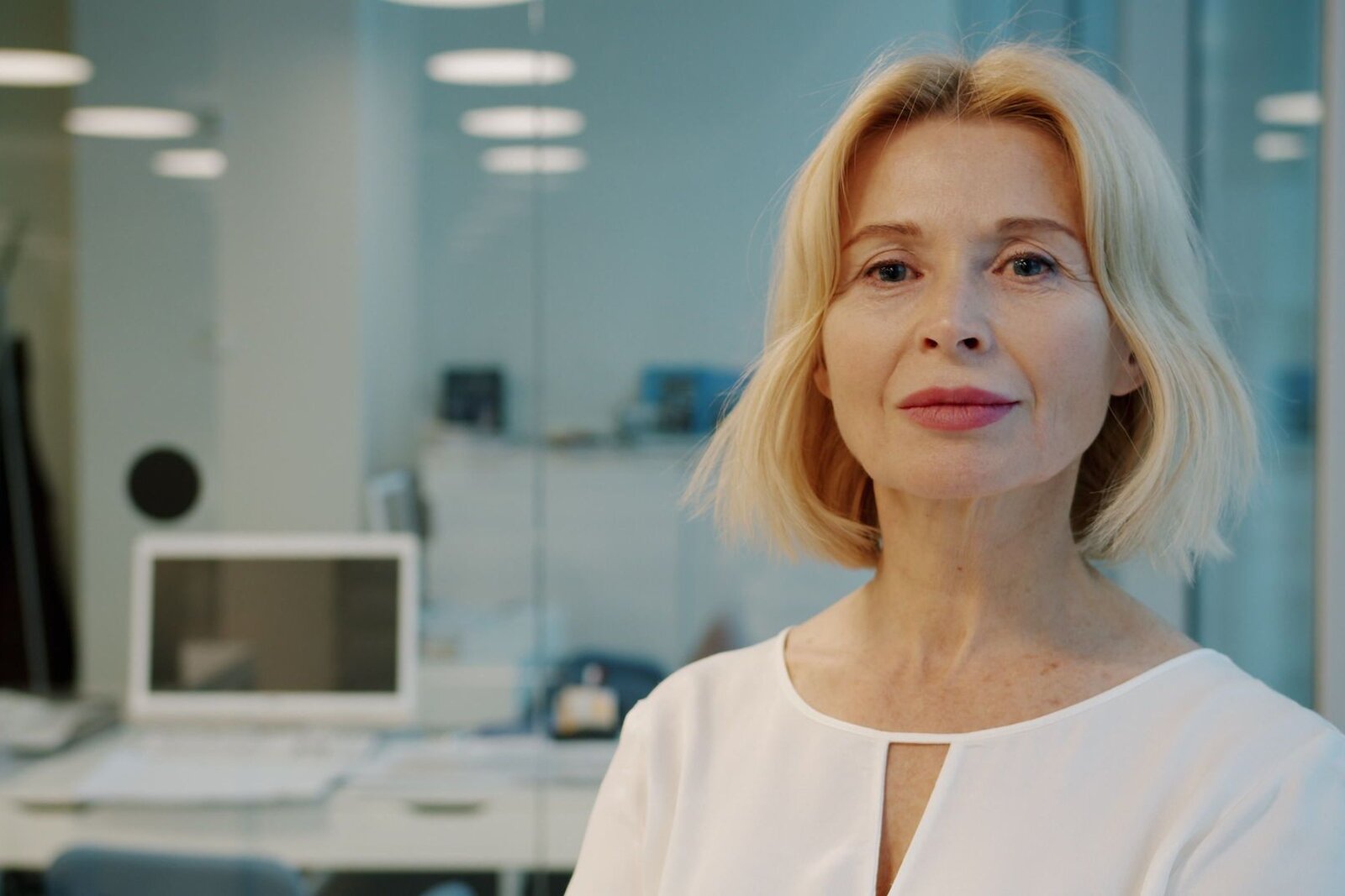 A medtech executive in a bright open office, standing in for Sequel Med Tech's FDA clearance announcement
